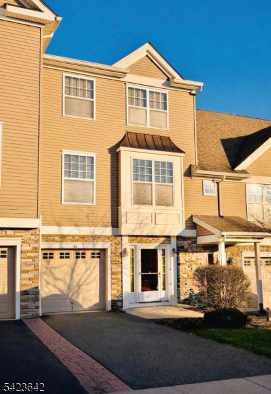 Welcome to Panther Valley! A gated community offering the perfect blend of convenience and beautiful outdoor surroundings. This stunning 3-bedroom, 2.5-bathroom townhome features hardwood floors, an open-concept main level, and an abundance of natural light throughout. The kitchen offers sliding doors that lead directly to a private patio perfect for relaxing or entertaining. Enjoy all that Panther Valley has to offer, including multiple swimming pools, tennis courts, basketball courts, and beautifully maintained grounds with scenic views that create a true resort-style living experience. Move-in ready and thoughtfully designed, this home truly has nothing to do but unpack and enjoy.