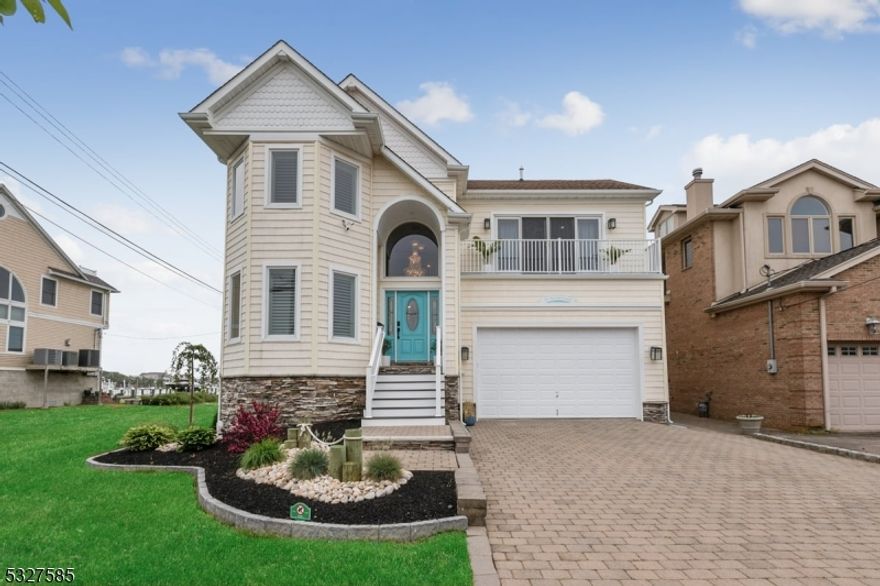 Experience luxury coastal living at this stunning home in Point Pleasant Beach. Designed for comfort and sophistication, this smart-wired property offers breathtaking water views and high-end finishes throughout. The sun-filled, open-concept living and dining area is perfect for entertaining, with panoramic water views. The chef's kitchen features a granite island, BlueStar six-burner stove, double ovens, and a Sub-Zero fridge. A cozy home office, laundry room, and two new hot water heaters complete the first floor. Enjoy one of two fireplaces or unwind in the theater room with an 85-inch TV and reclining seats.The second level includes four spacious bedrooms with hardwood floors, smart TVs, and ample closet space. The primary suite boasts bay windows with water views, a sitting area, and a spa-like en-suite with a soaking tub and pocket-door-enclosed commode. A large full bath and two linen closets provide added convenience. The third level features a guest lounge with a wet bar, mini fridge, balcony with water views, and a billiards table.The professionally landscaped yard includes a smart-wired, heated saltwater pool, outdoor kitchen with multi-tier grill, and boat dock for easy water access. The two-car garage offers ample parking and storage. This exceptional home is a true masterpiece of shore living. Schedule your private tour today!