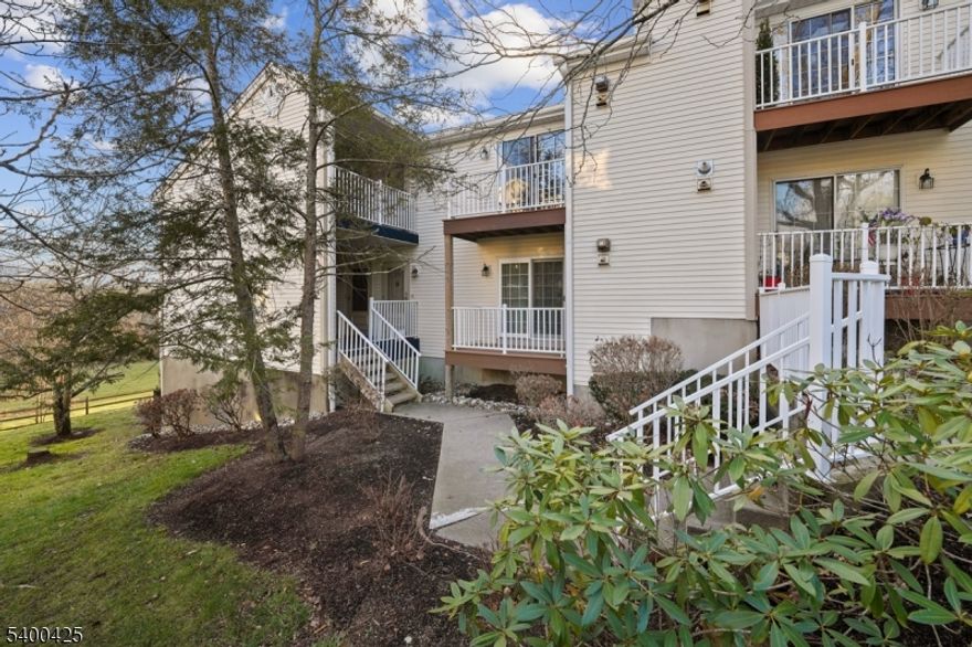 Beautifully updated 2BR 1BA condo in the highly sought-after Spring Ridge community. This bright and inviting home features hardwood floors throughout, an eat-in kitchen with stone countertops and neutral tile, and a spacious layout ideal for comfortable living. The primary bedroom includes a walk-in closet and balcony access. Enjoy the convenience of an in-unit washer and dryer, a one-car garage, and an additional detached storage room offering plenty of extra space. Located close to shopping, dining, parks, and major highways for an easy commute. Highly rated school district. On-site community manager, pool, playground, tennis courts, clubhouse, bocce court