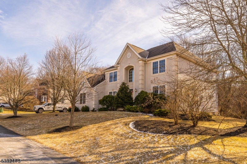 Elegant colonial-style home located in the desirable Hidden Hills community of Hackettstown, NJ. Step into the grand two-story foyer leading to formal living and dining areas, perfect for entertaining. Set on a meticulously landscaped 0.58-acre lot, the backyard is ideal for outdoor living with a private patio and lush surroundings. Conveniently located near shopping, dining, and major highways. Don't miss this stunning home " schedule your showing today!