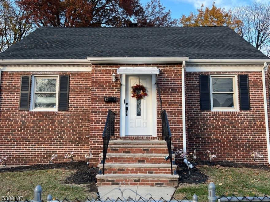 Welcome home to this stunning 3-bedroom, 2-full-bath all-brick Cape Cod, fully renovated in 2019 and meticulously maintained ever since. With a new roof (2022), new windows, and modern finishes throughout, this home offers true peace of mind and exceptional value. Step inside to a nice-size living room with beautiful hardwood floors throughout, setting a warm and welcoming tone the moment you enter. Flow into the inviting eat-in kitchen, featuring granite countertops, stainless steel appliances, and ample cabinetry perfect for everyday meals or entertaining. The first floor offers two spacious bedrooms and a fully updated bathroom, while the entire second level boasts a very large master bedroom with plenty of room to relax and unwind. The full basement expands your living potential even further, complete with a full bathroom, dedicated laundry area (washer & dryer included), and abundant storage or recreation space. Outside, enjoy your own private oasis a large backyard with a gazebo and a brand-new white vinyl fence, ideal for outdoor gatherings, pets, or peaceful evenings at home. Perfectly located on the Hillside border, this home offers unbeatable convenience with quick access to the Garden State Parkway, I-78, and the NJ Turnpike ideal for commuters. This home checks every box: updated, move-in ready, and in a prime location. Don't miss it!