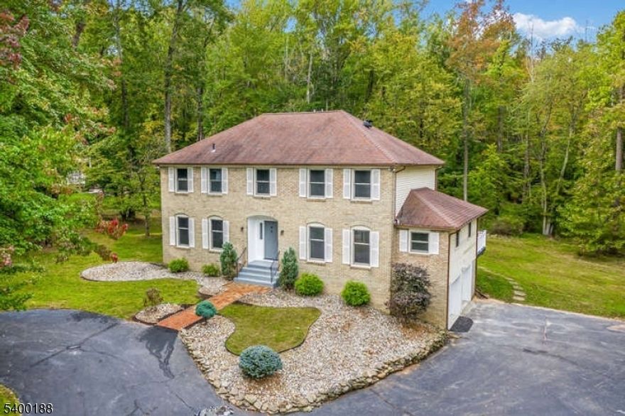 Step into this beautifully designed 4-bed, 2.5 bath home in the heart of Warren-where modern style meets everyday comfort. The open-concept main level is the star of the show, featuring white shaker cabinetry, sleek quartz countertops a massive 87" center island, and a full suite of Samsung stainless-steel appliances. The hardwood floors throughout the home create an elegant, seamless flow, complemented by fresh paint that makes every room feel bright and welcoming. Upstairs, the primary suite delivers true retreat vibes with a spacious walk-in closet and spa-inspired bath offering a 72' double vanity, a frameless 72' glass shower, and a luxurious Kohler Hydro Rail system-perfect for unwinding at the end of the day. The finished basement adds valuable bonus space-ideal for a recreation room, gym, home office, or play area-whatever fits your lifestyle. This move- in ready home checks all the boxes: Modern upgrades, thoughtful finishes, and prime location in one of Warren's most desirable neighborhoods. Close to major highways, restaurants, shopping and much more!