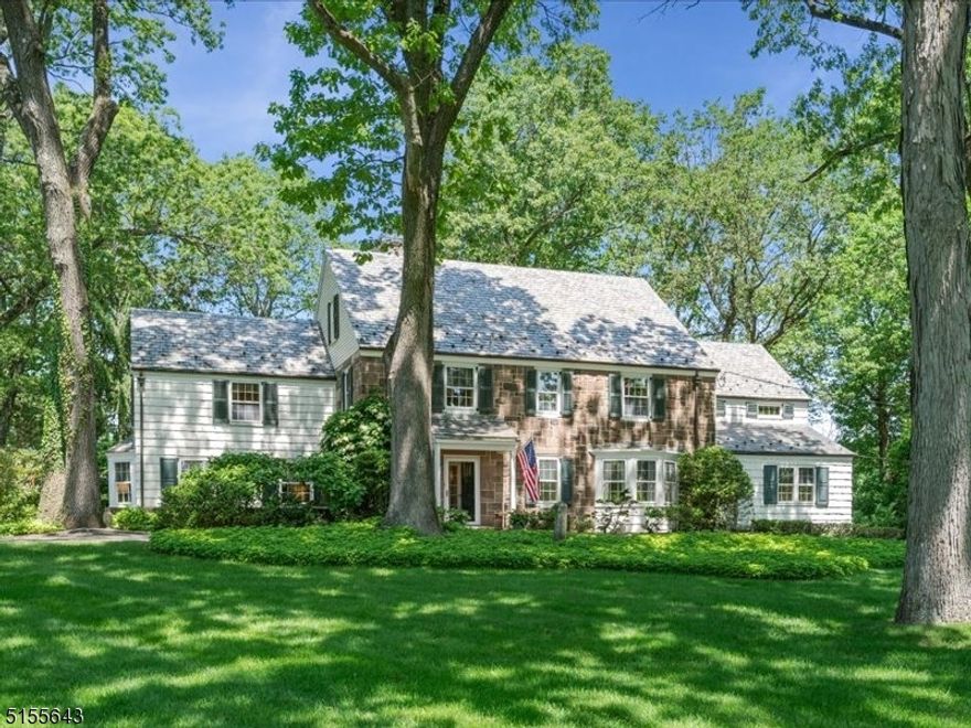 Ideally located on one of Essex Fells' most desired streets, this gracious Colonial offers the flawless combination of timeless elegance and comfortable living sought by today's buyers. The home boasts plenty of curb appeal with a sweeping front lawn, circular driveway and exceptional grounds that feature two Patios, an English garden, mature trees and specimen plantings. Interior highlights include grand formal Living and Dining rooms, lovely Sun Room, spacious eat-in Kitchen with Breakfast area that opens to Family Room and a home office with separate entrance. The Master Suite is complete with en-suite Bath, Dressing Room with walk-in closet and large Sitting Room. Finished lower level with Recreation and Game rooms. Essex Fells is an idyllic hamlet with excellent schools, extraordinary natural beauty and small town charm with an easy commute to NYC.
