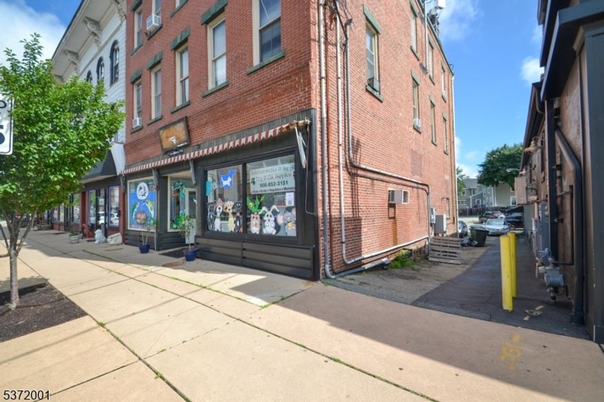 Prime Mixed-Use Investment Property in Thriving Downtown Location. An exceptional investment opportunity to own a fully leased, mixed-use building in the heart of a vibrant, walkable downtown neighborhood. This property features one established retail tenant on the ground floor and four fully occupied residential units above, offering a stable and diversified income stream from day one. Located on a bustling street surrounded by shops, restaurants, and amenities, this high-visibility building benefits from constant foot traffic and easy accessibility. The property includes five assigned parking spaces, with ample public parking available nearby for both tenants and customers.With zero vacancies, strong rental history, and solid in-place cash flow, this is a turnkey investment in a sought-after urban setting. Whether you're expanding your portfolio or entering the market, this property checks all the boxes for savvy investors. Mixed-use building: 1 retail + 4 residential units. 100% occupied " no vacancies. Excellent downtown location with heavy foot traffic. 5 dedicated parking spaces + abundant public parking. Leased billboard on the roof adds additional income. Strong income potential with proven tenant stability
