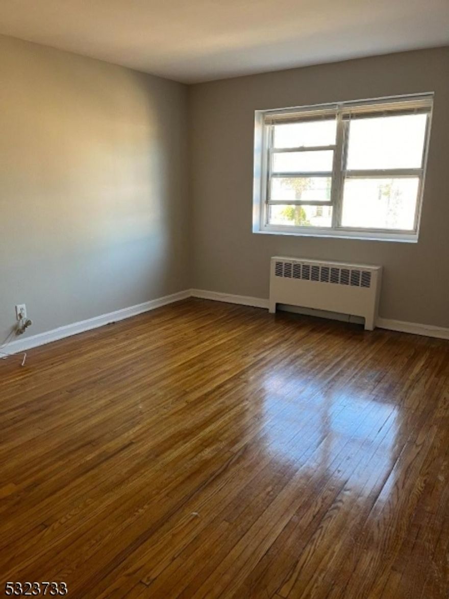 This quaint one bedroom one bath features all hardwood flooring throughout.  Walking distance to parks, restaurants, shopping and NJ Transit mid-town direct line to Penn Station NParking is not included. Unit is occupied. Must make an appointment to view.