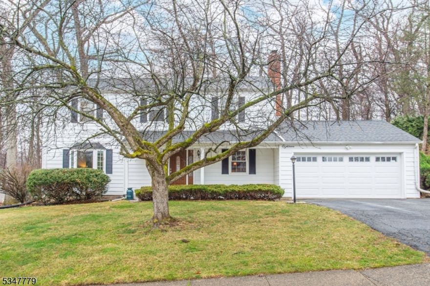 A beautiful home awaits you in Beacon Hill! Offering over 2,200 sqft of living space & an absolutely perfect floorplan. This flowing, classic layout is great for entertaining or everyday living.. Foyer welcomes you in & is bookended by a formal living room & dining room. Both boast large picture windows. Tons of natural light. The kitchen w/ large center island, granite countertops & stainless steel appliances opens to the cozy family room w/ wood burning brick-faced fireplace. Convenient powder room & laundry mudroom offers covered access to the oversized garage. Gorgeous HW flooring. Upstairs 4 generous sized bedrooms & two full baths include a primary suite w/ en-suite & stall shower. Bonus living in the basement w/rec room. Partially unfinished space provides storage along with an attic. Multi-zone heating & cooling. Stunning Backyard Oasis- Perfect for Entertaining & Relaxation! A Private Property with a large Deck & built in benches. Walking distance from NYC-Direct train station, shopping & parks. Enjoy bustling Dwtn Denville or choose to visit historic Mt Tabor w/all its colorful homes, post office, library & LIVE events. Top schools. Shows true pride of ownership. Don't miss it!