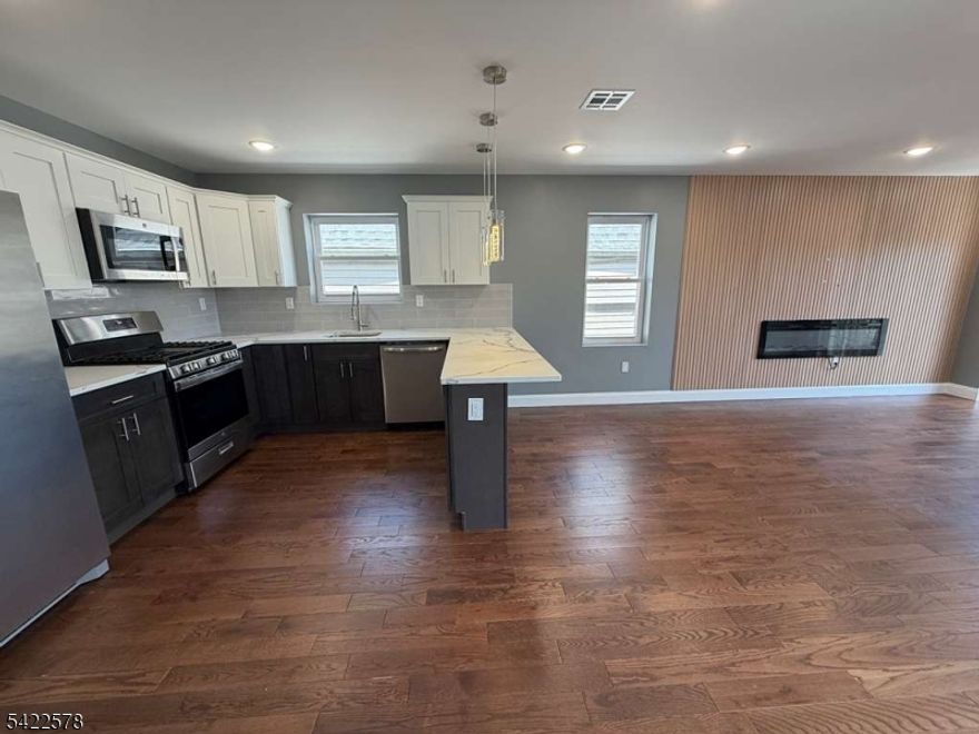 Welcome to this stunning newer construction home in Newark, built in 2024 and thoughtfully designed with modern living in mind. This beautifully crafted residence features a spacious, open layout with generously sized rooms and an abundance of natural light throughout.The sleek, contemporary kitchen is a true highlight, offering stylish finishes, ample cabinetry, and plenty of windows that create a bright and inviting atmosphere. The primary bedroom serves as a private retreat, complete with an en-suite bathroom and a large walk-in closet.Enjoy the convenience of an in-unit laundry room, adding ease and efficiency to your daily routine.Conveniently located near transportation and schools, this home offers both comfort and accessibility. Ample street parking is readily available. Tenant pays gas and electric. LL covers Sewer. No pets!!A perfect blend of modern design and everyday functionality don't miss this opportunity!