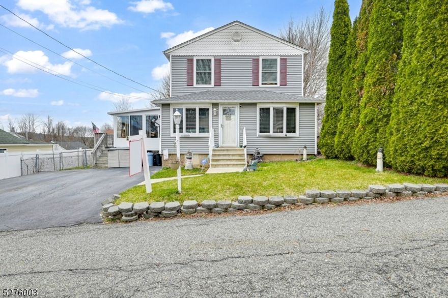 This Charming Colonial Home In The Upper Greenwood Lake Area Has 3 Bedrooms, 2 Bathrooms, And A 3 Season Sunroom Room Heated! Highlights Include A Pellet Stove, Newer Furnace, New Sunroom Windows, A Generac Generator, Newer Roof, Remodeled Kitchen, And A Beautiful Cambridge Stone Paver Patio! Updates Have Been Made Over The Years To Enhance The Property! The Property Also Features Central Air, Spacious Rooms, Ample Closet Space, And A Fenced-In Yard!Upper Greenwood Lake Offers A Variety Of Activities Such As Motor Boating, Kayaking, Swimming, Fishing, And Jet Skiing! Additionally, Residents Can Enjoy Year-Round Activities Including Shopping, Dining, Golf Courses, Ski Resorts, Wineries, Apple Orchards, Drive-In Theaters, And More!