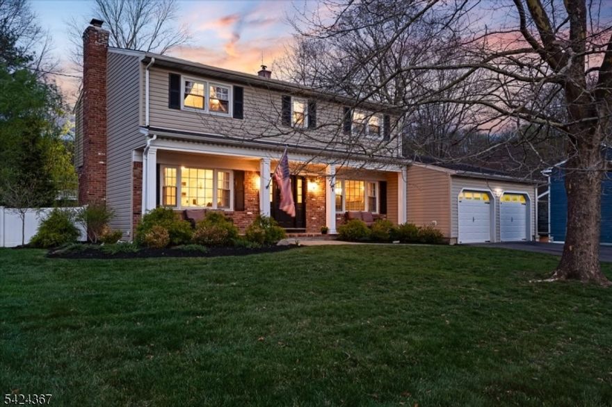 Welcome to 25 Jay Street! This beautifully renovated four-bedroom colonial sits in the highly sought-after Succasunna section of Roxbury. On a private, tree-lined lot with a vinyl privacy fence, this home offers the perfect blend of modern upgrades, timeless design + everyday comfort. Completely transformed since 2020 with over $150,000 in upgrades, this home delivers true peace of mind with major improvements already completed. Inside, you'll find a spacious + functional layout enhanced by custom millwork, new doors, trim + molding, along with hardwood floors throughout. The fully updated kitchen features custom cabinetry, granite countertops, marble backsplash, stainless steel appliances, porcelain tile flooring, and upgraded lighting, along with a custom pantry. All bathrooms have been renovated, including a stunning primary bath with marble shower, double vanity + porcelain tile flooring complementing a beautifully updated secondary bath. The partially finished basement offers flexible + attractive bonus space. Mechanical upgrades include a fully rewired home, new plumbing, tankless water heater, updated furnace + AC condenser + french drains with sump pumps providing efficiency + long-term reliability. Outside, your private backyard features a large deck perfect for entertaining, professionally landscaped grounds, privacy trees + a detached 1.5-car garage with reinforced concrete slab + electric. Minutes from major commuting highways, shopping + dining! Don't miss it!