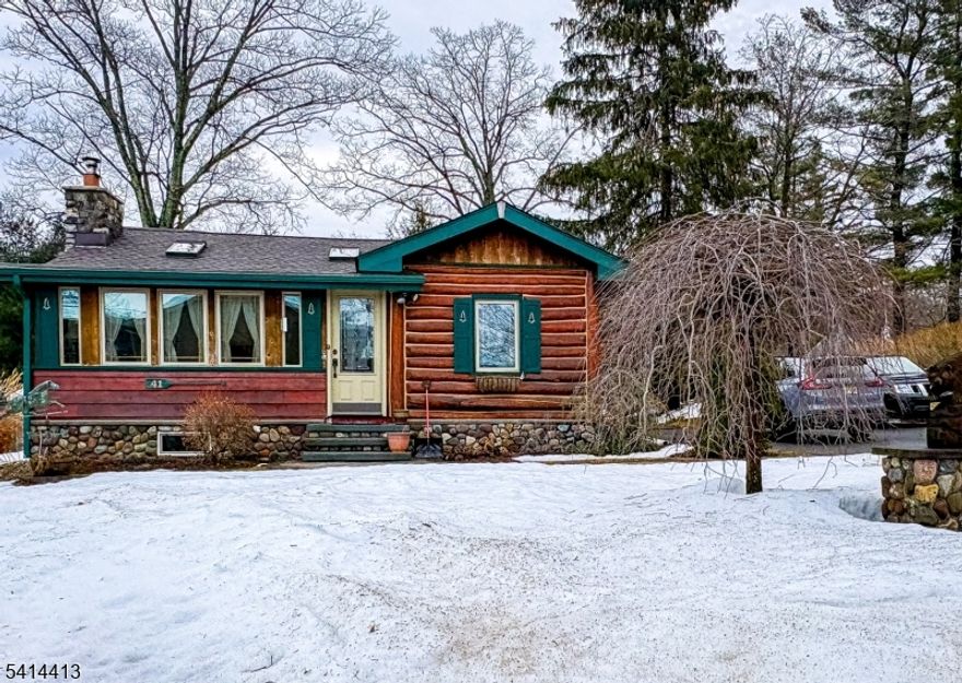 Beautifully maintained log home owned by a tree professional who truly appreciated quality craftsmanship and natural wood. This move-in-ready property has been extensively updated with a newer roof, renovated kitchen with all new cabinets and granite countertops, new windows and skylights, covered deck, tongue-and-groove pine ceilings, woodstove insert, and a brand-new septic system currently being installed. Located just minutes off Route 23 in a desirable lake community offering beach and playground access. A perfect blend of rustic charm and modern updates nothing to do but move in and enjoy!