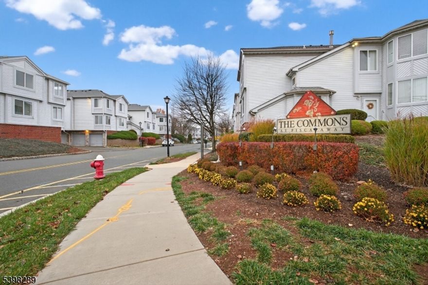 Welcome to The Commons at Piscataway, a highly desirable community featuring a playground and tennis court. This bright and spacious one-bedroom, one-bath condo includes a versatile den that can be used as a second bedroom or a home office, offering flexibility to suit your lifestyle. The primary bedroom boasts a generous layout with a large closet and plenty of natural light. The open-concept living and dining area includes a wood-burning fireplace, perfect for cozy evenings, and glass sliders that lead to your private patio. Attached, two-car garage below the unit that adds convenience and functionality. Water heater replaced Sept 2025 & HVAC replaced Aug 2025. Located under 2 miles from Edison Train Station, this commuter's dream is close to major highways, Rutgers University, local libraries, shopping, and dining. Enjoy the perfect blend of comfort, convenience, and community amenities in this Piscataway condo.