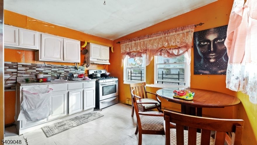 Welcome to 414 Market Street in Paterson, NJ, a two-family home situated in a convenient, city-style neighborhood close to shops, schools, and public transportation. The property offers a total of 4 bedrooms and 3 full bathrooms, with cozy, well-sized units that feature functional layouts and comfortable living spaces. The home would benefit from light updates, offering an excellent opportunity for buyers looking to add their personal touch and enhance value. Ideal for both investors and owner-occupants, this property presents flexibility, potential, and a commuter-friendly location. A great option for those seeking a multi-family home with upside.