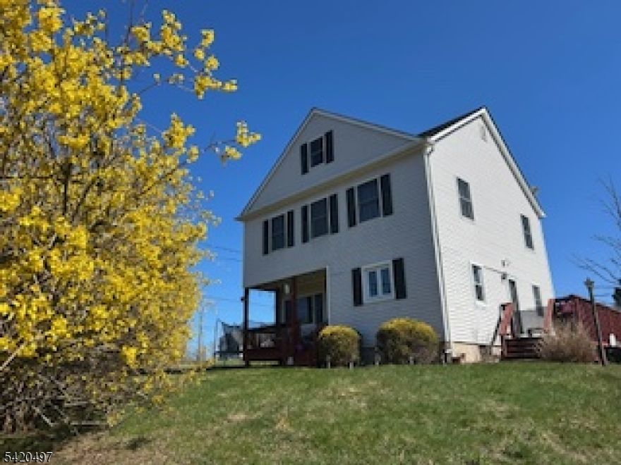 Welcome Home!This beautifully renovated property sits high on a hill in the charming river town of Milford, offering breathtaking views and an unbeatable lifestyle.The home features three spacious bedrooms with generous closet space, gleaming hardwood floors throughout, and three full baths. The elegant dining room opens via sliding glass doors to a wraparound deck   perfect for entertaining. Both the front porch and deck will be freshly repainted by the seller prior to closing.The finished walkout basement offers abundant storage plus a dedicated room ideal for a home office, along with a one-car garage. Located in the highly regarded Hunterdon County Blue Ribbon school district, this home is surrounded by endless outdoor recreation   hiking, biking, and floating on the Delaware River are all right at your doorstep.Enjoy a quick trip to Frenchtown for festivals, shopping, and dining, with Route 78 and all major roadways just 10 minutes away for an easy commute.This is the one you've been waiting for   come see it before it's gone!