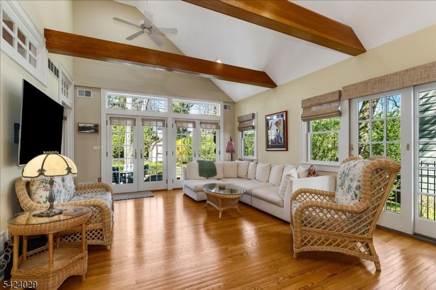 Welcome to 955 Summit Avenue, a 3/4 bedroom storybook home tucked in one of Westfield's most desirable locations. From the moment you arrive, this home captures your attention with its timeless charm and inviting presence. Step inside to a spacious living room, where a beautiful gas fireplace creates the perfect setting for both relaxing evenings and elegant entertaining. The formal dining room flows seamlessly, offering an ideal space for gatherings both large and small. At the heart of the home, the kitchen opens to a bright eat-in area and an expansive family room with high ceilings with wood beams across the ceilings designed for everyday living with comfort and ease.A private first-floor office provides the flexibility today's lifestyle demands which can be used as a 4th bedroom, while French doors lead you outside to a beautifully landscaped backyard  perfect for entertaining, play, or quiet moments at home. Second level offers three well-appointed bedrooms, including a serene primary ensuite complete with its own ensuite bath for your own private retreat. The finished lower level adds even more versatility, featuring a full bath and the perfect space for a recreation room, gym, or guest suite.Charming, functional, and ideally located 955 Summit Avenue is the perfect place to call home.