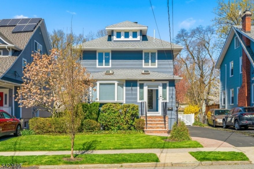 Welcome to this beautifully renovated 3-bedroom, 2.5-bath home that perfectly blends modern style with everyday comfort. From the moment you step inside, you'll appreciate the thoughtfully updated interior featuring an open-concept layout, abundant natural light, and high-end finishes throughout. The stunning kitchen is the heart of the home, complete with sleek cabinetry, quartz countertops, stainless steel appliances, a pantry, and a spacious island ideal for entertaining. The adjoining living and dining areas create a seamless flow, complete with hardwood flooring and a gas marble fireplace. Upstairs, the generous primary suite offers a private retreat with a beautifully updated en-suite bath, private deck, and walk-in closet. Two additional bedrooms are well-sized and share a stylish full bathroom. A convenient half bath is located on the main level for guests. Outside, enjoy a private, fenced-in backyard and a large wraparound deck, perfect for outdoor gatherings or quiet evenings at home. Lots of storage space in the basement, attic, and one-car garage. Additional highlights include central air, a whole-house generator, recessed lighting, Hunter Douglas custom motorized blinds, and crown molding. Rutherford offers a vibrant downtown with lots of great restaurants and shops. NYC is only 13.2 miles from Rutherford! Commuting to NYC is a breeze. The NJ Transit bus takes 37 minutes, and the train takes only 22 minutes. Don't miss this opportunity to make it yours!