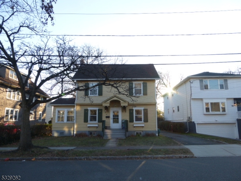 Updated Montclair single family home with 3 beds and 2 full baths on 2 levels. Updated kitchen has granite counters, recessed lighting, many cabinets, stone tiles & white appliances including a dishwasher. The formal dining room has pass through to kitchen. Large living room with WBFP & wall sconces. Bonus heated sun room. Original cherry-wood floors throughout. 4 ceiling fans and 22 windows push the breeze through. 1 spot in the detached garage with key-less door opener. The basement has the second full bathroom, room for an office, laundry and storage. There is additional storage in the full walk-up attic. 1/2 mile to Walnut St train station and 3 blocks to #66 Decamp bus. An NTN background check is required, pets are negotiable, the tenant pays a 1 month rent fee.