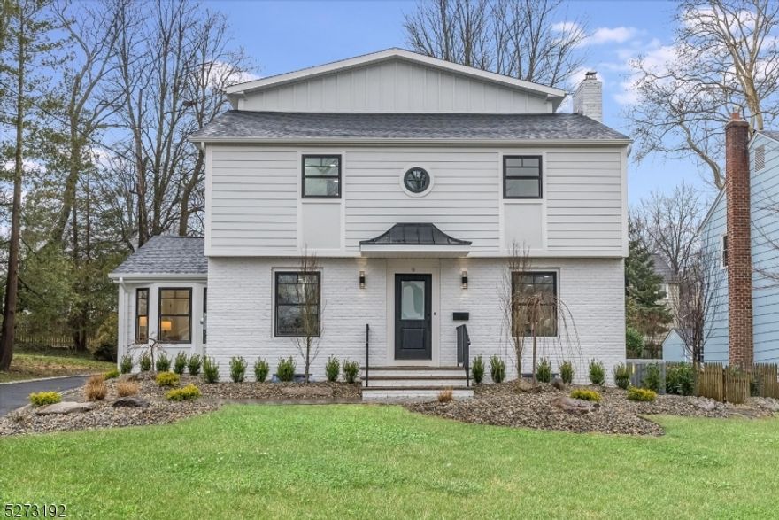 Style meets convenience in this ALL newly renovated Colonial sanctuary with desirable proximity to the train to NYC, Glenwood Elementary School and town! This bright, airy, and beautifully curated home boasts a fresh modern renovation with gleaming hardwood floors, brand-new windows, and designer touches throughout, exuding timeless charm and modern sophistication. As you step inside, you're greeted by an inviting family room adorned with a leathered granite surround FP. This opens to the bright kitchen with Thermadore appliances and center island. Adjacent lies a sunlit breakfast area offering views of the yard through an expanse of windows, creating a relaxing ambiance for your more casual dining rituals. Entertain guests in style in the formal dining room accented by a wet bar w wine fridge.  A versatile bedroom/office space with vaulted ceiling and full bath, ideal for guests or remote work needs, completes the first level. Venture upstairs to discover the serene retreat of the primary suite along with two additional bedrooms, a hall bath, and convenient laundry. Need more space? Ascend to the third floor, where two more bedrooms (or offices) and another full bath await, providing ample room for your evolving lifestyle. Unwind and recharge in the lower level recreation space, complete with yet another bedroom/office and full bath, offering endless possibilities for relaxation or productivity. A flat, fenced-in yard with a charming patio beckons for al fresco enjoyment.