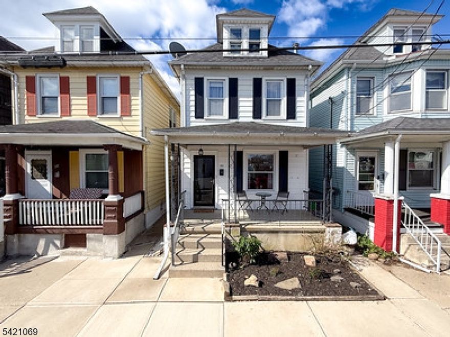 Charming Colonial offering 3 bed 1 bath, blending classic character w/thoughtful modern updates.Updated kitchen features an LG oven w/ built-in air fryer, dishwasher 2026,providing style and functionality for everyday cooking/entertaining. Just off the kitchen,bright and airy 3-season porch extends the living space, offering the perfect spot to enjoy morning coffee or unwind at end of day.The inviting living room showcases a cozy fireplace,while hardwood floors flow seamlessly throughout the home, adding warmth and timeless appeal. Relax/enjoy the outdoors on the charming front porch, ideal for sitting /watching the neighborhood, or simply enjoying a quiet moment.Major updates provide peace of mind, include Lenox furnace (approx7), roof (approx10),newer split AC/heat(approx2),ensuring comfort and efficiency year-round. Step outside to a beautifully designed backyard retreat featuring a paver patio,built-in fire pit, a pergola w/new canopy perfect for entertaining,gatherings,or quiet nights under the stars.Close to schools,parks,malls,restaurants,commuter routes,5 min.from historical Easton, PA. Don't miss your chance to own this move-in ready gem right here in Phillipsburg! Home sits on a well-maintained,quiet street w/friendly neighbors.All that's left to do is unpack and enjoy!This home is ideal for first-time buyers, investors,or anyone seeking comfort and convenience in a growing area. All loans welcome VA,FHA,Conv.,Cash,and or Renovation ETC. Schedule your showing today!