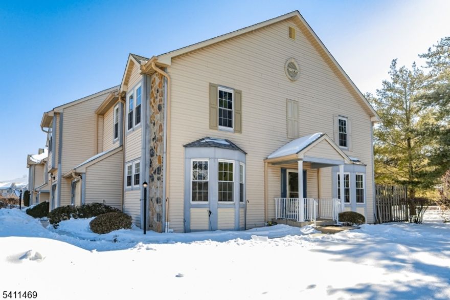 Perfectly positioned in what is arguably one of the most desirable locations within Princeton Village, this end-unit townhome offers sweeping green views and the coveted combination of Montgomery Township's top-rated schools with a Princeton mailing address. Just minutes from Princeton, and major commuting routes, the setting is as convenient as it is serene. The home's orientation is truly special, beginning with an expansive, open stretch of lush greenery that unfolds just beyond the front door. Inside, the open-concept living and dining room is bright and inviting, featuring wood floors, a gas fireplace, and glass door that extends the living space onto the deck. The dine-in kitchen is finished with granite countertops and offers direct access to the one-car garage, along with a powder room. The finished basement dramatically expands the home's usable space with two generous rooms. One currently serves as a home office, and the other is a game or media room, whatever you prefer, and each is flanked by substantial storage rooms. Recent upgrades include a water heater and an HVAC system, both within three years. Upstairs, a thoughtfully designed second floor includes a laundry closet with shelving, a large linen closet, and a well-appointed hall bath. The primary suite includes a walk-in closet and a sky-lit bathroom featuring a stall shower and a big soaking tub. Two additional bedrooms offer excellent proportions, not often the case in townhome secondary bedrooms.