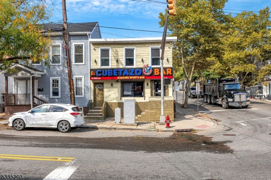 Totally renovated 2023 Excellent opportunity to own a mixed- use building near the center of Paterson. First floor EL CUBETAZO BAR & KARAOKE & SPORTS "Sale with out liquor lic" second floor 2BRS combo LR kit full bath central air full unfinished basement 1/2 bath. Brand new refrigeration equipment, 2 glass door back bar coolers, 1 bottle cooler and 1 ICE machine 3-compartment sink, 1 additional sink, 2 ice bins with 7 circuit boards, 1 glass rack and 1 glasswasher machine 2 soda gun system connected to the ice bin 1 additional standing freezer (apartment)Granite countertop Brand new furniture, bar stools & tables, regular chairs & tables, and leather couches Crown molding LED lighting Recessed ceiling lighting 2 JBL speakers 10 in-ceiling speaker SONOS system 13 Samsung Smart TVs Fully wired Ethernet cabling for every Smart TV HDMI wiring for every Smart TV HDMI switch HDMI splitter 1 EPSON projector plus 120' electric screen Digital LED display for front windowHardwood floor.