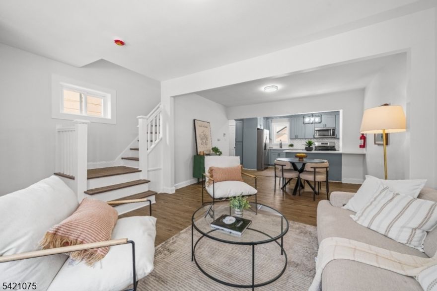 Welcome to 18 Hilton Avenue! Fully renovated from top to bottom, this home offers an ideal opportunity for comfortable, turnkey living in a prime Maplewood location. Step inside and be greeted by a sun filled open concept that perfectly balances open living with defined spaces. The formal living and dining rooms flow seamlessly into an open kitchen, complete with a seating island ideal for everyday living and entertaining. The second floor features three generous bedrooms and a beautifully updated full bathroom. The third floor adds a versatile bonus room that can be used as a private getaway, home office, or playroom. Additional highlights include a full basement, a detached garage, and convenient parking, providing both extra storage and everyday ease. With brand new central air and heat, quality craftsmanship throughout, and a prime location, this home is a fantastic starter opportunity