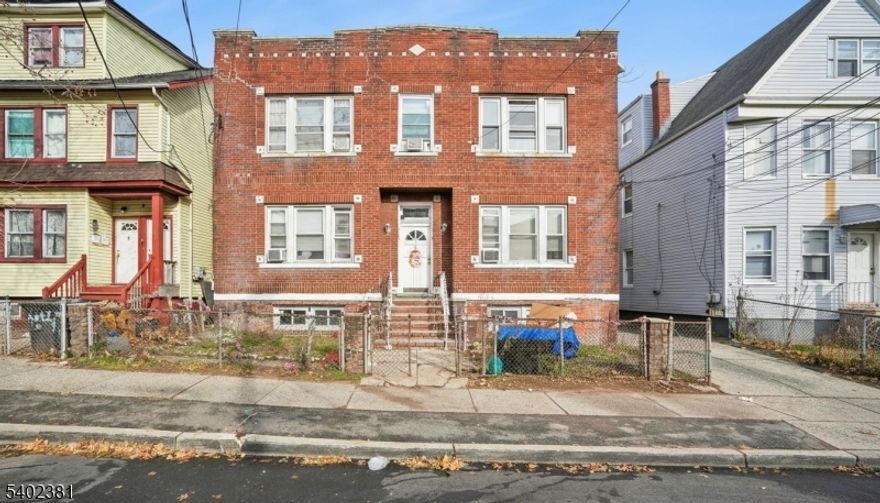 Conveniently located in the heart of Orange, this 4-Unit Multi-Family Brick Home is filled with charm and original details throughout. Fully occupied, each unit is unique in its own way. Situated in a residential area only a few blocks away to NYC direct trains, shopping and dining, this is an ideal opportunity for owner-occupied or investment purposes. Units 1, 2 & 3 features 2 Bedrooms, Eat-In-Kitchen, Living Room, Bath and Pantry, Unit 4 features 3 Bedrooms, Eat-In-Kitchen, Living Room, Bath and Pantry. Each unit has separate electric and gas meters...heat and water are centralized.  Rear porches for outdoor relaxation are bonus space for some units. Flat rear paved area is ideal for outdoor grilling. Each tenant has 1 designated parking spot. Street parking is available for additional parking. Great investment opportunity.