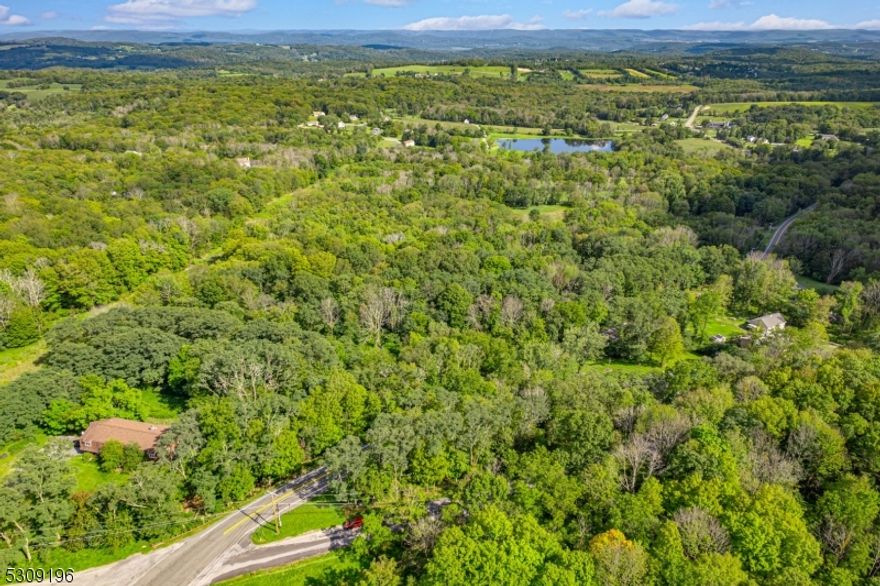 This is the lot you will want to build your dream home or hobby farm on. Work with your builder to take advantage of stunning views from multiple angles on this property. Healthy wooded lot offers plenty of privacy.  Beautiful location minutes from multiple state parks and year round recreation areas.
