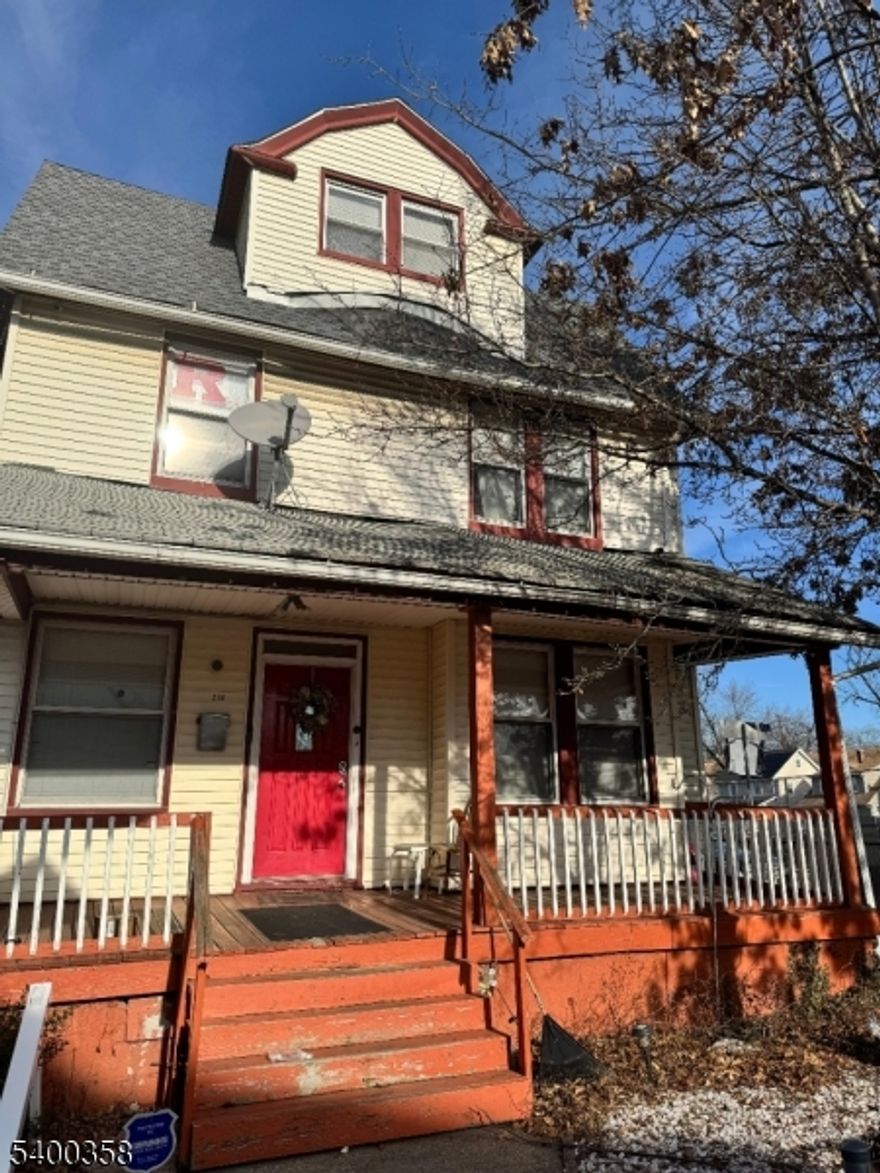 Great Opportunity. Charming Center Hall Colonial Home. This 6 Bedroom 3 Bath Home has tons of opportunities, sits on 30ft Wide Lot. Original Details of this home include , 2nd Stairway to 2nd Level, Formal Dining Room with Pocket Doors, Stain Glass Windows and Fireplace. Den, and Living Room. The top level offers tons of space with 6 Oversized Bedrooms and Finished Attic Loft with its own Bath and Kitchenette Area.. Driveway at back of the home, Can fit up to 3 cars. Open Front Yard and Porch. Bright and Airy Rooms. Large Living Room opens off the foyer on the front entrance . Gas Fireplace in Den/Dining Room. Partially Finished Full Basement with Full Bath, great for use as a Additional Room or Workshop.