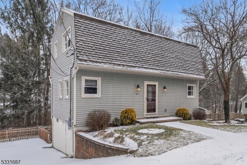 Welcome to this beautifully maintained 3-bedroom, 1 1/2-bathroom home nestled in the peaceful and sought-after Lake Lenape Lake community. With hardwood floors throughout, this home offers both comfort and style in every room.The spacious living areas are perfect for everyday living and entertaining, and the well-maintained condition ensures you can move right in with ease. The kitchen features plenty of counter space and cabinetry, making meal prep a breeze. Step outside to your fenced-in backyard, a private oasis ideal for relaxing or hosting gatherings. The patio area is perfect for enjoying outdoor meals or simply unwinding. This home also Boast a long driveway with ample parking, providing plenty of space for guests. Whether you're enjoying the tranquil surroundings of Lake Lenape or relaxing in your beautifully maintained home, this property offers the perfect blend of comfort and convenience.Don't miss the opportunity to own this well-kept gem in a desirable community!