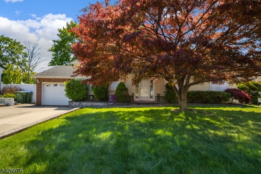 Welcome to this raised ranch in a great location ideal for upsizers or downsizers seeking comfort and convenience. The main level offers three spacious bedrooms and two full baths, highlighted by a granite kitchen and hardwood floors (under the carpets) that add warmth and timeless appeal. The fully finished walk-out lower level features a generous recreation room, an additional full bath and plenty of storage areas perfect for guests. Outside, enjoy an oversized concrete driveway leading to an attached garage and a fully fenced yard that provides privacy and safe play space. Thoughtful updates and flexible living areas make this home move-in ready while offering plenty of potential. Don't miss this rare raised-ranch opportunity in a sought-after neighborhood schedule a showing today.