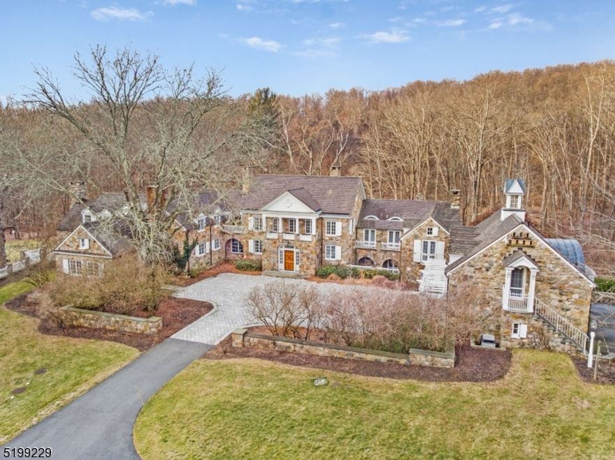 Welcome to Fox Chase Farm - an absolutely stunning private equine compound replete with magnificent 17 room fieldstone manor house embracing the grace and sophistication of a bygone era.  Comprehensive equestrian facilities including a lighted riding ring, picturesque paddocks with covered hay feeders, post and beam barn with six-stalls, wash/grooming bay, expansive hayloft, and two-bedroom apartment.  Detached three-car garage with au pair/guest suite above, maple syrup cabin, lighted tennis courts, sparkling in-ground swimming pool, and cascading stream feeding a tranquil pond- all this, and more, sited on over 55 acres including pristine woodlands and rustic meadows.  All-stone, circa 1932 manor house with a top to bottom renovation completed in 1994 has 17 rooms including 7 bedrooms, 6 full baths, 3 powder rooms, 5 fireplaces, lovely living room, open floor plan great room with exposed beams, gorgeous gourmet designer kitchen, resplendent breakfast room, butler's pantry, exquisite formal dining room with dreamy pond views, handsome two-story library, cloistered first-floor primary bedroom suite with sumptuous bath and private office/sitting room, billiard, recreation, and exercise rooms, lower-level walk-out, custom millwork, recessed windows, and wide-plank hardwood flooring throughout--this captivating home has a comfortable, easy living floor plan and seamless flow.  2024 taxes will be reduced to $69,446