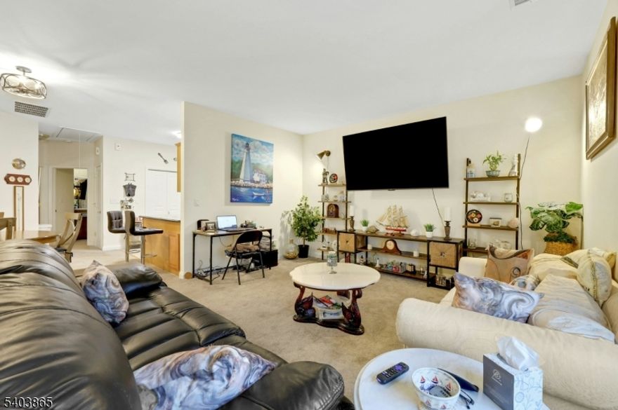 Step into a Fresh Chapter of Easy Living at This Spacious 2-Bedroom Condo in a 55+ Community! This Great Unit Offers an Open Layout with Natural Light, Newer Kitchen Appliances, New HVAC, Balcony to Enjoy Outdoor Space, and Parking. Newer Water Heater, Appliances, Carpeting, Paint, and Bath (all done in 2023). Pet Friendly (25 lb limit), HOA Includes Sewer, and Communal Picnic Table & BBQ for your enjoyment!