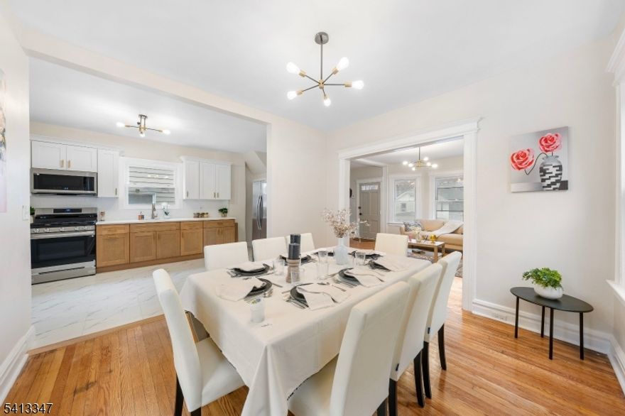 Rare opportunity to own a 3-bed, 2-bath single-family home on a sprawling double lot, Open-concept NEW KITCHEN Featuring stainless steel appliances and modern finishes. Tons of windows throughout create a bright, airy atmosphere. 3 comfortable bedrooms plus a fully finished basement for extra recreation or storage. The double lot provides a park like massive backyard for entertaining, for summer gatherings, gardening, or future expansion. washer dryer hookup. Dedicated off-street parking ensures you never have to hunt for a spot. Turn-key, modern, and ready for you to move in!
