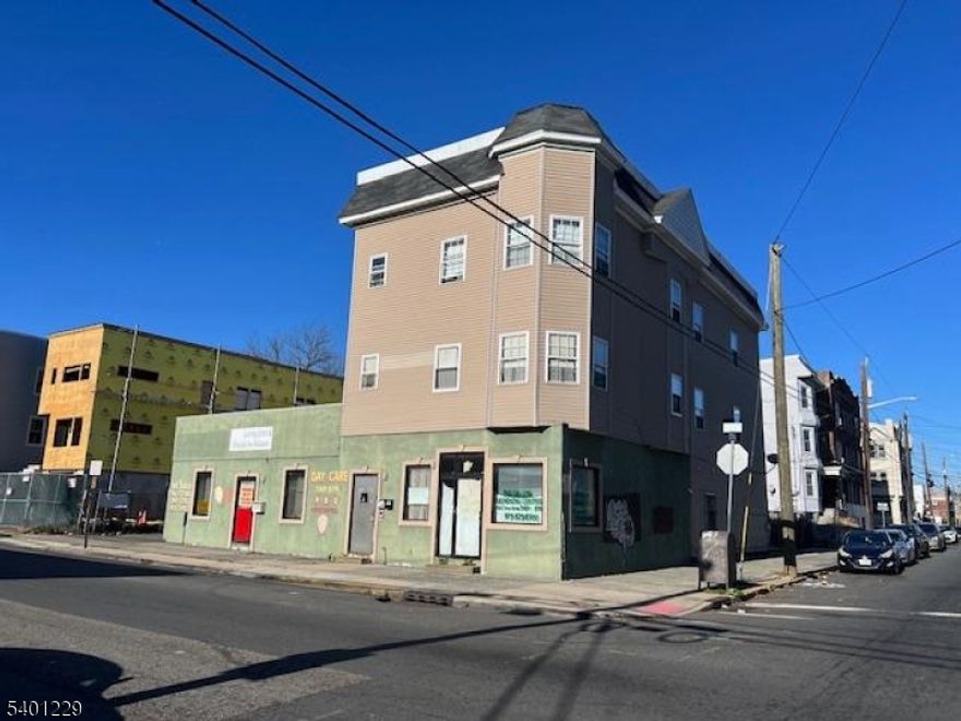 Discover an exceptional mixed use property offering strong rental income in Irvington.Well maintained property features a commercial storefront plus 2 spacious apartments.Additionally it has parking.New construction on neighboring lot.