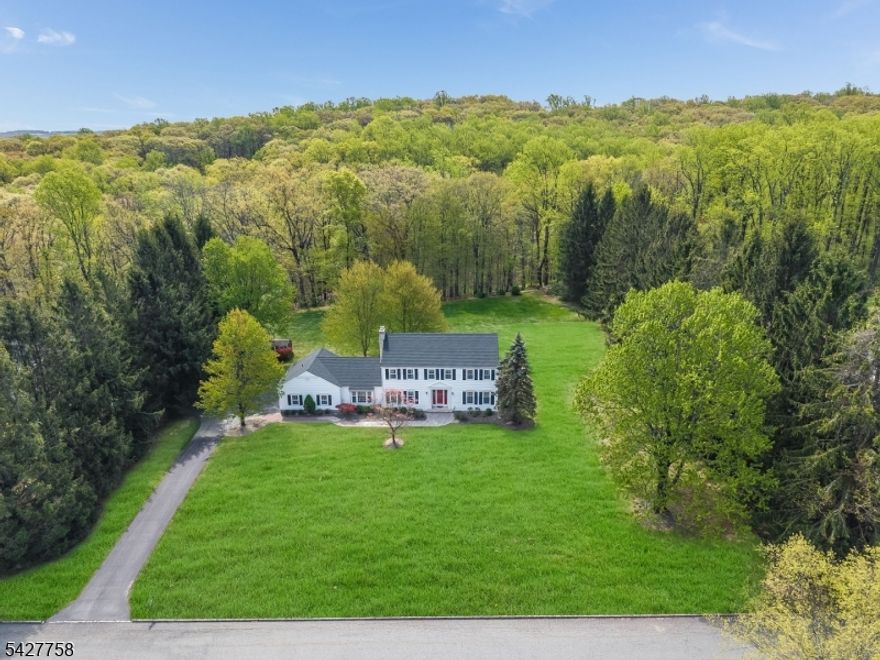 4-bedroom, 2.5-bath Center Hall Colonial offering approximately 2,583 sq ft, ideally situated on a quiet cul-de-sac in one of Union Township's most desirable neighborhoods in Hunterdon County. Set on 1.5 acres with no homes behind you, this property backs to preserved land, providing exceptional privacy and a peaceful setting.Conveniently located just off Route 78, the home offers easy access to the Town of Clinton, Flemington, and the scenic Delaware River towns.The first floor features a dedicated home office and a spacious family room with sliders leading to a hardscape patio perfect for seamless indoor/outdoor living and entertaining. The kitchen includes an induction cooktop, adding a modern touch for today's lifestyle.Upstairs, you'll find four generously sized bedrooms, including a primary suite with a large walk-in closet and private bath. A full bath with tub/shower combination serves the additional bedrooms.A wonderful opportunity to own a well-located home with space, privacy, and a desirable neighborhood setting. Home Warranty Incuded