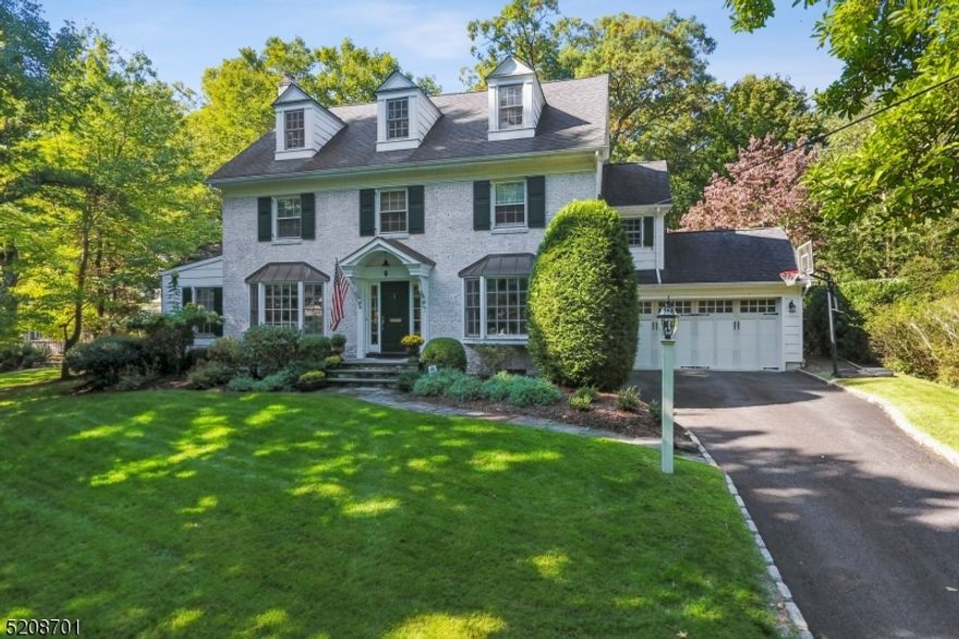 FABULOUSLY RENOVATED COLONIAL * IDEAL SHORT HILLS LOCATION * A rare opportunity to acquire your dream home that has an easy-flowing floor plan and has been completely renovated for todays living. Entertain in the living room by the fireplace, host in the elegant dining room, be industrious in the 1st flr office or simply relax in the open-concept kitchen/family room. The state-of-the-art kitchen has custom cabinetry, SS appliances, center island with granite counters, bar seating, separate breakfast room, French door patio access, deluxe mudroom with back entrance & attached, over-sized 2-car garage. Upstairs, 5BRs include the primary suite that has 2 WICs and a luxurious marble bath: double vanity, soaking tub & glass shower. Bright, beautiful 3rd level is perfect for guests or 2nd office. The LL is a welcome surprise offering a rec rm w/ built ins, laundry room & Bonus Space that could be a home gym or whatever you may need. All mechanicals, plumbing, electrical, multi-zone CAC & roof were replaced by current owners. Main space flows effortlessly to the bluestone patio & professionally landscaped property with multi-zone sprinklers for easy indoor-outdoor entertaining. WALK TO EVERYTHING: all top-rated Millburn schools, including Glenwood Elementary (0.6miles), C.H.Arboretum and the Short Hills train station (0.8miles) with direct trains to speedily bring you home from NYC. A wonderful retreat in a fantastic location--this custom luxury home DOES NOT DISAPPOINT!