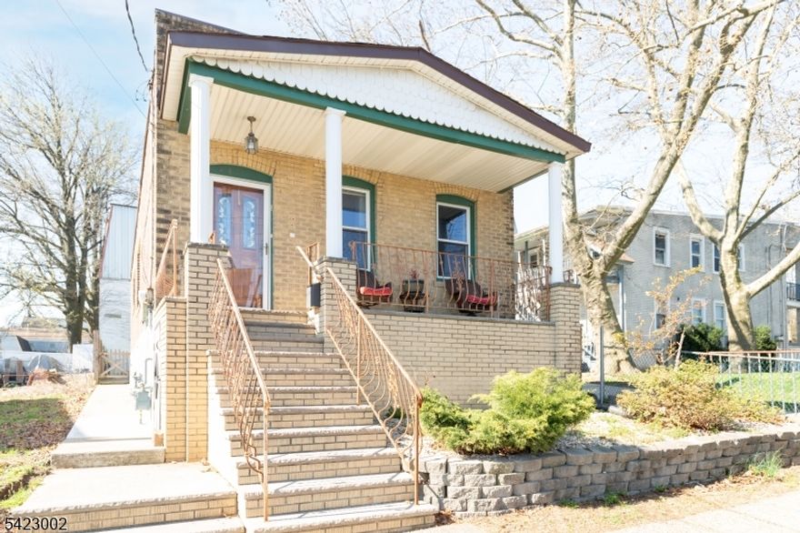 Great Opportunity to get your new home for less than the cost of a rental! This charming, beautifully decorated and renovated solid brick 2 bedroom 2 full bath ranch home with high ceilings, located on the north side of town. Close proximity to major highways like GS Parkway, Rt 440, Outerbridge crossing, Rt 9, as well as, the Woodbridge downtown and train station. This move-in ready home features a picture-perfect covered front sitting porch with storage underneath. Inside, formal living room with electric fireplace, good sized formal dining room and large updated eat-in kitchen with recessed lighting, white shaker cabinets, butcher block countertops, white subway tile backsplash, stainless steel appliances, including French door refrigerator, gas range/oven and countertop microwave. 2 large bedrooms and main bathroom on the first floor. Partially finished basement with recessed lighting includes 3 bonus rooms, 2nd full bathroom, plus laundry and utility rooms and still plenty of room for storage. Central air and forced hot air. Out back, enjoy relaxing in the private fenced-in low maintenance backyard with a nice-sized deck.