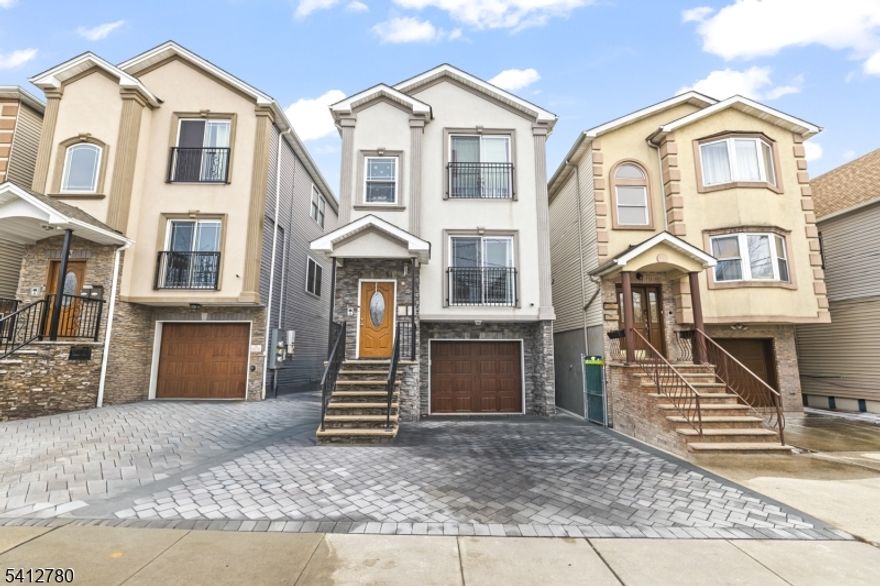 Discover 56 Delaware St, a stunning two-family home built in 2017, located in the desirable Peterstown section of Elizabeth, NJ. This modern property offers both comfort and excellent income potential, making it perfect for investors or owner-occupants. Featuring a total of 6 bedrooms and 5 bathrooms, each unit provides 3 spacious bedrooms and 2 full baths. The first-floor unit boasts an open living and dining area with a functional, contemporary kitchen, while the second-floor unit offers a bright and inviting design with a beautifully equipped kitchen. Additional highlights include a finished basement with a full bathroom, ideal for recreation or storage. The property also includes an attached garage, driveway, and fenced backyard, perfect for outdoor gatherings. Conveniently located near public transportation, shopping, and major highways, this home offers easy access to everything Elizabeth has to offer. The vibrant Peterstown community provides a lively atmosphere with plenty of local amenities. Move-in ready and offering strong rental potential. Don't miss out on this fantastic opportunity schedule your viewing of 56 Delaware St today!