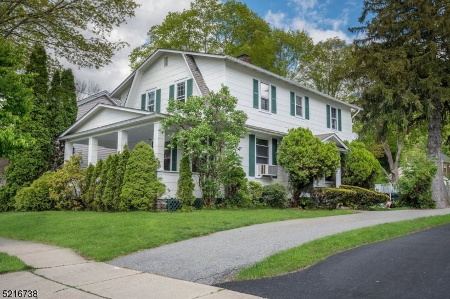 Sip lemonade from your covered front porch while you watch the annual Stanhope Memorial Day parade! Fantastic outdoor space overlooking Main Street, minutes to main highways and byways, shopping and dining!  This historic colonial home has very spacious rooms, wide staircase, wood floors, 9' ceilings on the first floor, deep lot with above ground pool and so much charm!  Welcoming foyer leads to formal living room with wood burning fireplace, dining room and kitchen with pantry (could be a future half bath) and all appliances (washer and dryer stay too). Second floor offers 4 large bedrooms and updated main bath with tub shower.  Most windows have been updated with thermal pane, 2 sheds, freshly painted exterior - must see this one yourself!