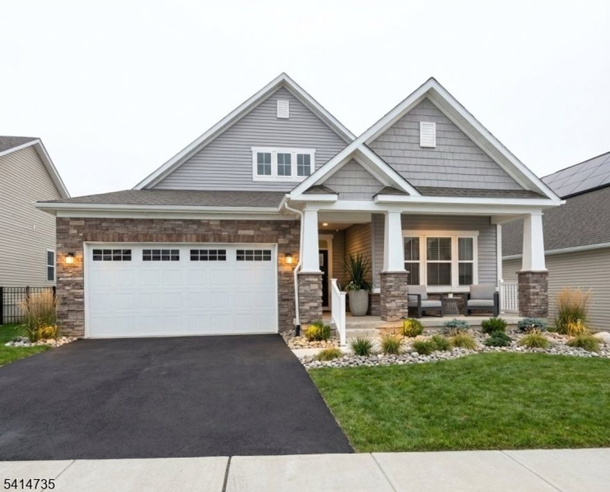 Welcome to this beautifully upgraded Palladio model by Ryan Homes, originally the community's model home, located in the sought-after Hawk Pointe 55+ active adult community. This spacious 2-bedroom, 3-bath ranch offers the ease of first-floor living with thoughtful design and premium finishes throughout. The open-concept floor plan features an upgraded kitchen complete with quartz countertops, stainless steel appliances, tile backsplash, and a large center island, perfect for gathering and entertaining. The kitchen flows seamlessly into the bright dinette area and comfortable family room, creating an inviting space for everyday living. Sliding doors lead to a covered porch, ideal for relaxing or enjoying outdoor dining. A versatile flex room offers endless possibilities and can easily function as a formal dining room, living room, or home office. The primary suite features a tray ceiling, walk-in closet, and private bath, creating a peaceful retreat. A second bedroom and additional full bath provide comfortable accommodations for guests. The fully finished lower level significantly expands the living space and includes a full bathroom, making it ideal for a media room, exercise space, guest area, or home office. There is also a dedicated utility and storage area. Located in the desirable Hawk Pointe community, residents enjoy a vibrant 55+ lifestyle and a beautifully maintained neighborhood