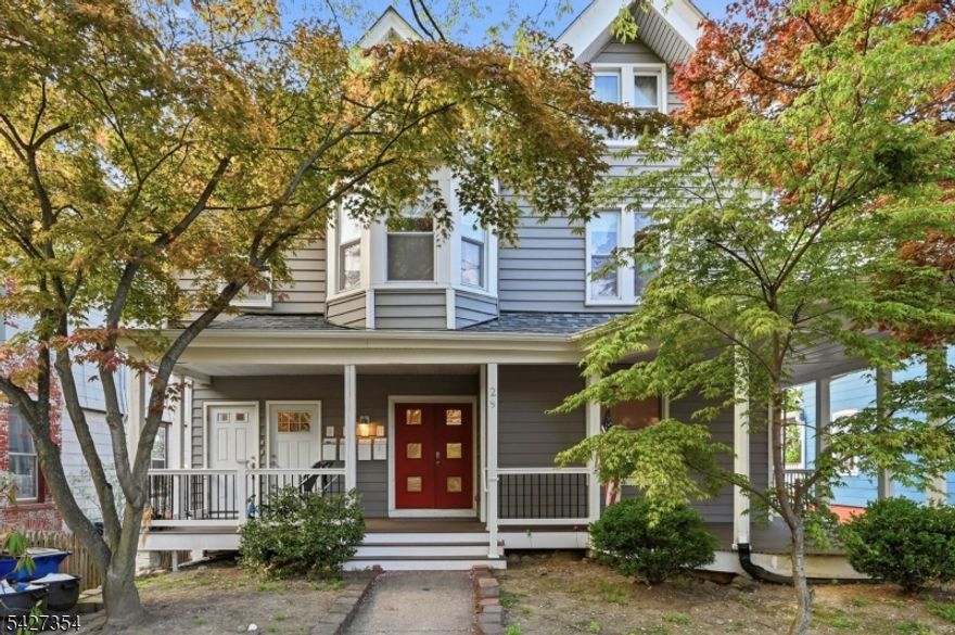 Welcome to 29 Western Ave, a beautifully renovated  3-bedroom, 2-bath townhouse offering move-in ready, low-maintenance living in a convenient location close to downtown, shopping, dining, and public transportation. This updated townhouse features a functional and flexible layout with the main level offering one bedroom and a full bathroom with a stand-alone shower, along with an open layout with comfortable living and dining areas for everyday living. The ground level expands the space with two additional bedrooms, a  family room, and a second full bathroom, providing versatile living options. This property has been rebuilt from the studs up in 2018, and the home has been well maintained throughout. A standout feature is the multiple outdoor living areas, including a welcoming front porch, a back deck, and a ground-level patio, offering great options for outdoor enjoyment. Convenient access to major highways enhances the appeal. Please note: street parking only. Shared laundry room located within the building.