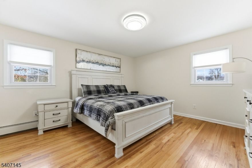 4 Bedroom Home on Quiet Cul-de-Sac with In-Ground Pool, Large Yard & Modern UpgradesTucked away on a peaceful cul-de-sac in Morris County, this move-in ready 4-bedroom, 2.5-bath home offers an ideal balance of privacy, functionality, and outdoor living. Set on a rare, large usable lot, the backyard is designed for entertaining featuring an in-ground pool, spacious deck, koi pond, and two storage sheds (one with electric). The yard is fully fenced and thoughtfully laid out, creating a private outdoor retreat. Inside, the bi-level layout offers flexible living across two levels. The main level features a bright living room, kitchen, three bedrooms including the primary suite and two full bathrooms: one in the primary suite and another conveniently located off the main living area. The lower level includes a large family room, an additional bedroom, half bath, laundry area, and direct garage access ideal for guests, work-from-home space, or everyday convenience.Bathrooms were updated in 2023, and the home includes central AC, baseboard heat, and public utilities. Additional upgrades include a 20,000-watt whole-home generator, Tesla-compatible EV charger, and water softener system.Located in a quiet, low-traffic neighborhood with strong schools and convenient access to shopping and major routes, this property offers space, privacy, and lifestyle in one place. Highest and best offers will be on Wednesday, April 22nd at 9:30 AM.