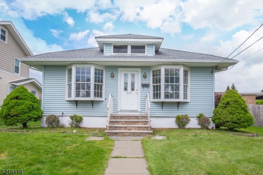 Step inside, where you will find an open layout with a cozy living room and dining room that is great for entertaining.  Spacious kitchen off of dining room with granite countertops, stainless steel appliances & plenty of cabinets. Three good sized bedrooms with a full bathroom. Basement with TONS of storage, full bath, and Laundry. Stay cool with central air.  Great backyard for relaxing outdoors. Driveway (off back street) to 2 car detached garage. Central AC. Great location! Minutes from center of town & public transportation & schools!