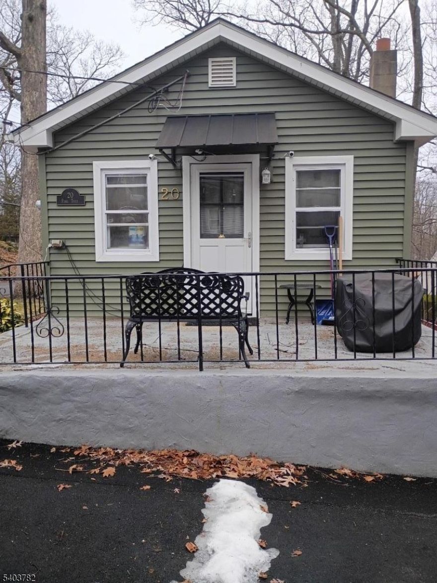 Adorable ranch style home with curb appeal. Enjoy all Lake Hopatcong has to offer in this active community- swimming, fishing, boating. The home is situated on a nice corner lot.  with many newer features (2023) roof, siding, windows (except 2) well pump, pressure tank, new hot water heater etc. plus public sewer (fee is paid quarterly $270.00 so approximately $90.00 a month), Lower basement has laundry area, potential family room space and room for a small office with a little cosmetic/ imagination updating this could be a true dream home.