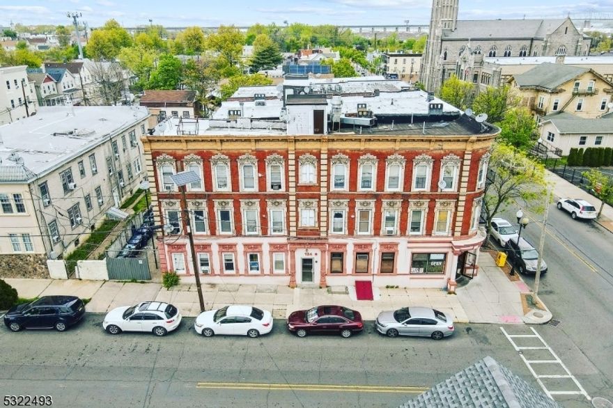Welcome to 475 State Street/124 William Street, Perth Amboy - a fully leased mixed-use commercial building located in the heart of Perth Amboy, New Jersey on a busy, high-visibility street.This versatile property offers a prime opportunity for entrepreneurs and investors looking to establish themselves in a thriving and bustling neighborhood.The 6,000 sq ft multi-tenant building features three levels of rental space and comes separately metered. The building is 100% leased with a well-known long-term storefront tenant with annual rental increases through 2026, as well as 10 residential apartments. Several apartments have updated kitchens and new hot water heaters installed in the past 3 years. Additionally, the building has a large basement for plenty of storage space. The building is located in a prime location, with easy access to major highways and transportation hubs. Perth Amboy is a thriving community with a rich cultural heritage and a diverse population, making it an ideal location for businesses that cater to a wide range of customers and clients. Eight out of 10 residential apartments are 1 bedroom units, while the remaining two units are studios. This building offers an incredible opportunity to steady financial gains and own a versatile and profitable commercial mixed-use property in one of New Jersey's most vibrant communities!