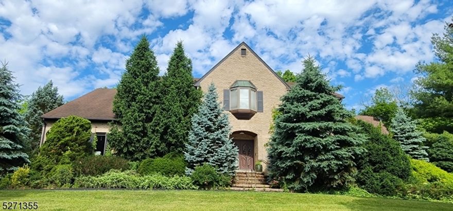 Custom Built All Center Hall Brick Colonial privately nestled in the heart of Florham Park on a sought- after Cul-De-Sac. This home offers the benefit of a prestigious address while being in the vicinity of local parks, major highways, fine dining and local shopping. It offers indoor and outdoor luxury with exquisite architectural designs, dramatic entrance and fine craftmanship. The beautiful chef's kitchen is a culinary delight featuring custom cabinetry and top -of-the-line appliances, creating perfect place for preparing gourmet meals. Formal living room and dining room, sun-drenched family room, recreation room, study, first floor bedroom, exercise room and 3 car garage. Total of 7 bedrooms, 6.5 baths. The primary suite occupies its own wing with bedroom, study, Spa-like bath, galley kitchen and a spacious closet. Welcome to the "Resort Style  backyard with an inground pool surrounded by mature trees for privacy. This luxury property is located on a 1.47 acre lot and is home to  Top Rated Florham Park Schools!. A Must See!