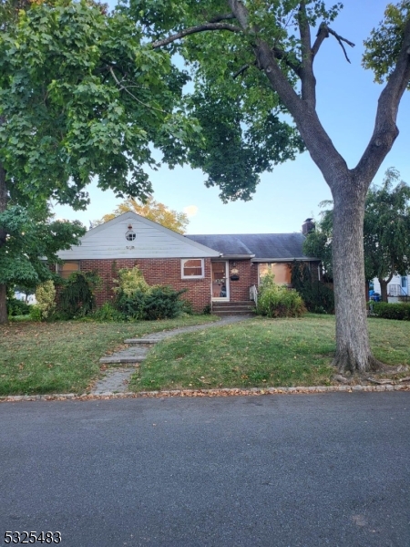 Show stopper ranch in the heart of Sunnyside that boasts three bedrooms with a possible fourth and full finished basement with kitchen and bath and oversized rec room. Attached garage and deck out back.Must see inside!!