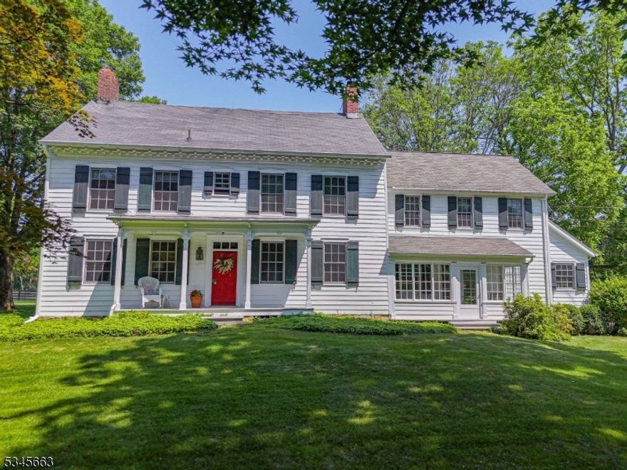 Just Reduced ? 'Tis the season to make your dream home a reality! Step into the ultimate hobbyist?s haven, set on 5.8 private, peaceful acres - ideal for celebrating cozy gatherings, evenings by the fire, and creating memories all season long. This 4BR, 3.5BA home blends rustic elegance with heart pine floors, exposed beams, five fireplaces, and custom built-ins that feel warm and welcoming this winter.The gourmet kitchen is designed for entertaining, featuring a Wolf 6-burner cooktop, Sub-Zero refrigerator, double Dacor ovens, and marble countertops - perfect for holiday feasts and farm-to-table cooking. Enjoy quiet mornings in the enclosed porch or unwind in the mahogany-lined 3-season room overlooking serene, wooded views.Outside, the property offers a carriage house (currently used as a garage and storage), a charming stone outbuilding, and a detached 1-bedroom apartment with separate septic and HVAC?ideal for holiday guests, rental income, or a private caretaker?s suite. An additional 1250 sq ft flexible-use space provides endless possibilities for a studio, workshop, or home office.A rare opportunity to enjoy sustainable living, privacy, and space - now reduced and ready to welcome you home this winter.