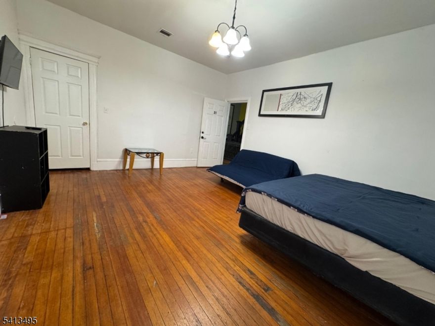 Private spacious room (approx. 16? x 13?) available for rent in a large, well-maintained home located in the desirable North Ward of Newark, just off Bloomfield Avenue.This generously sized room offers comfortable living space rarely found in traditional room rentals ? currently accommodating a queen-size bed and twin-size futon with additional room for dressers, seating, a desk, or lounge setup. The layout provides flexibility for residents who appreciate space for both sleeping and everyday living.The home features two fully equipped kitchens and five shared bathrooms, offering convenience and functionality for all residents. The room may be rented furnished or unfurnished based on your preference. Wi-Fi and all utilities are included in the rent. Conveniently located within a five-minute walk of multiple NJ Transit bus stops along Bloomfield Avenue, providing access to Downtown Newark, Newark Penn Station, Montclair, and direct routes to New York City. The property is also close to grocery stores, restaurants, cafes, pharmacies, everyday conveniences, and Branch Brook Park.