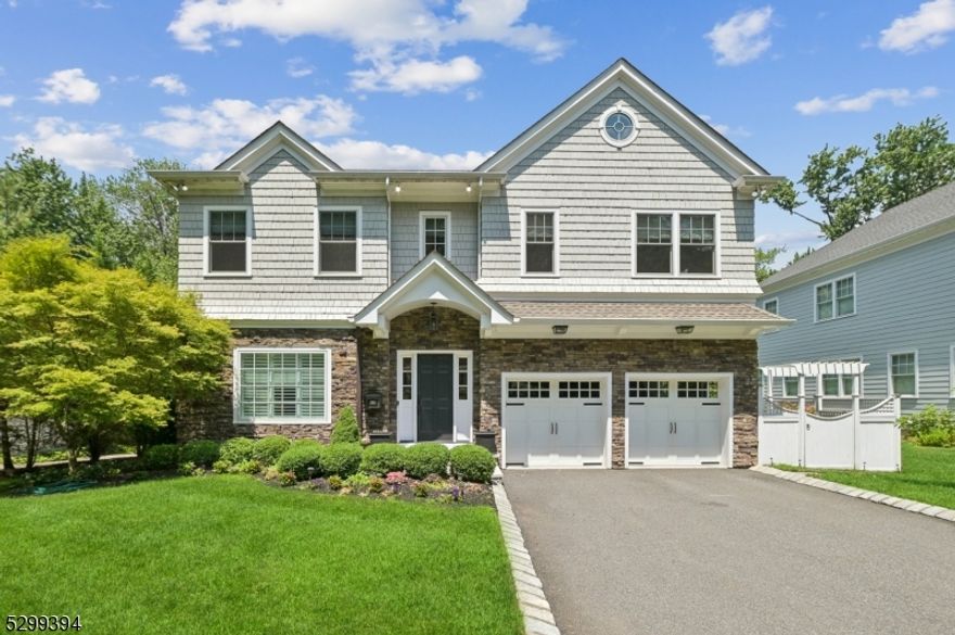 Welcome home to this bright and spacious newer custom colonial! This stylish masterpiece features 5 gorgeous bedrooms, 4.1 bathrooms, a dreamy expansive primary bedroom walk-in closet, large rec room in the finished basement, impressive open floor plan, and 2 car attached garage. The breathtaking details and finishes provide luxury living in the desirable Glenwood section of Short Hills. Additional features include high ceilings, an eat-in kitchen overlooking the great room, formal dining room, hardwood floors, chef?s kitchen, wine fridge, marble counters, spa-like bathroom with soaking tub, and dual vanities. Your outdoor amenities include a deck and huge yard with two separate areas created for privacy as well as fun backyard activities!